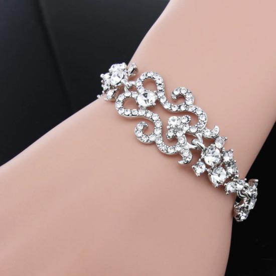 Elegant silver women’s bracelet with crystal motifs/